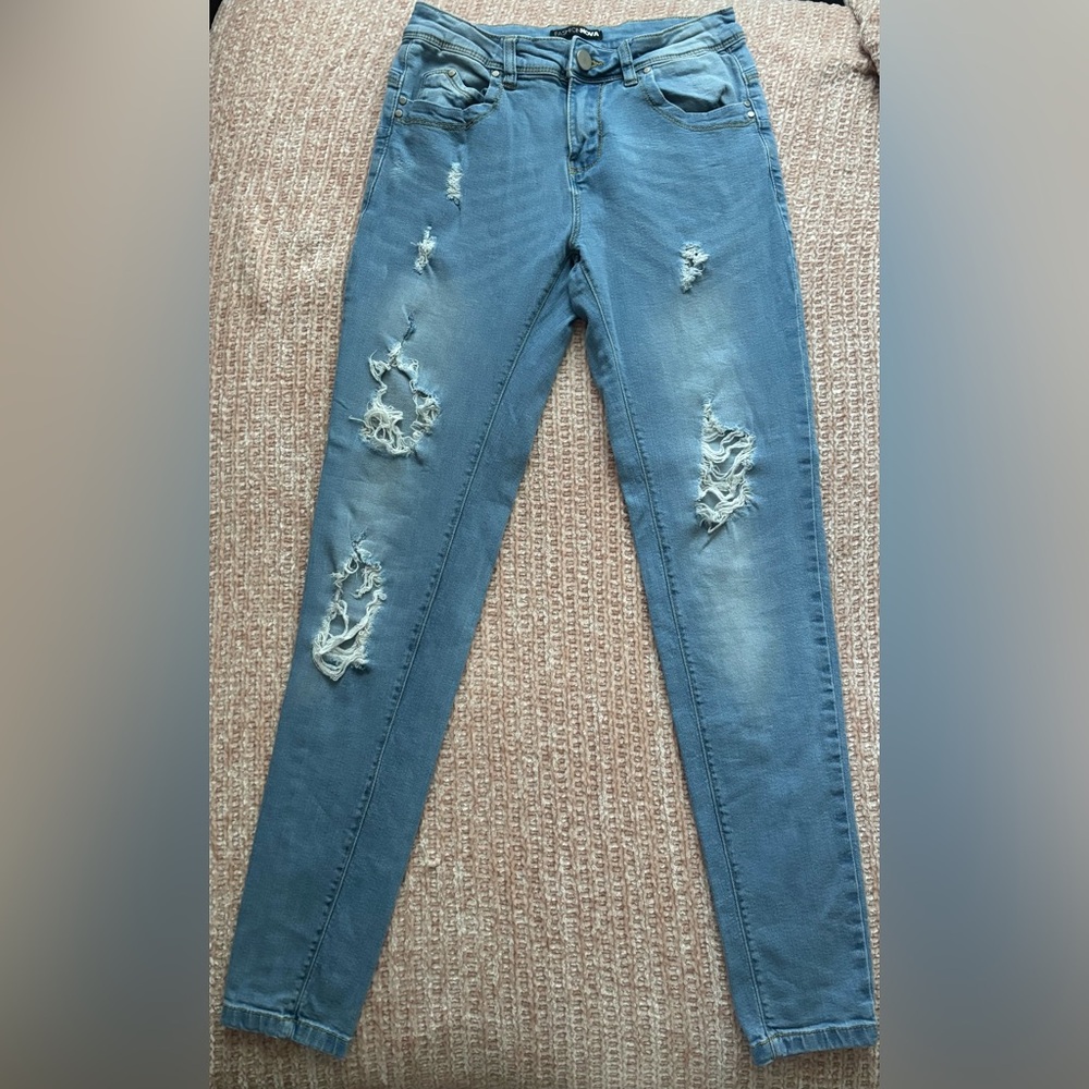 Fashion Nova Blue Jeans Distressed Design